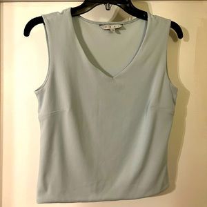 CAbi size medium blue crop blouse with busy darts